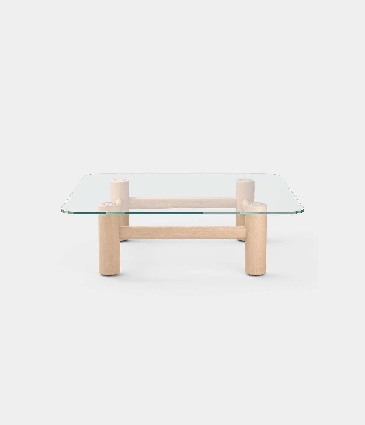 Boundary Couchtisch in Blau von Massproductions mit Holzbeinen vor weißem Hintergrund. Die elegante blaue Tischplatte kombiniert mit den natürlichen Holzbeinen schafft einen modernen, aber warmen Look, der durch den schlichten weißen Hintergrund noch weiter betont wird
